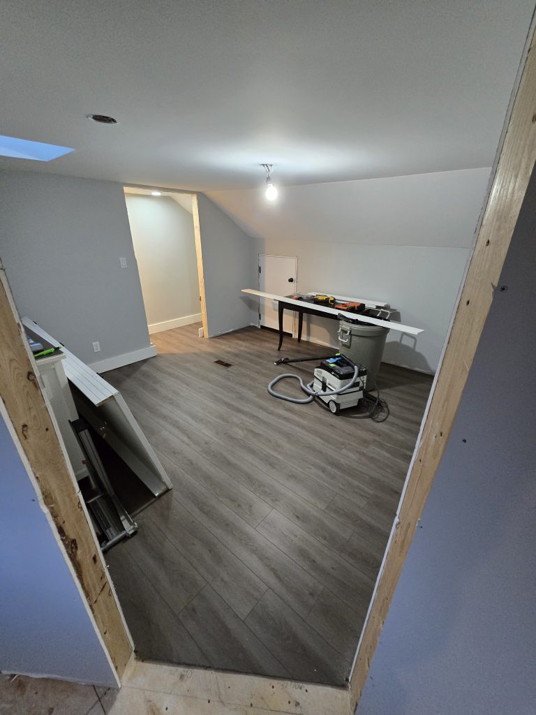 Finished drywall in a new bedroom.